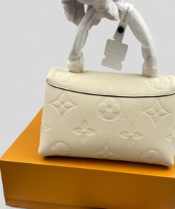 Louis Vuitton Madeleine BB Monogram Empreinte Creme Beige For Women, Shoulder and Crossbody Bags 9.4in/24cm LV M46008 - Image 4